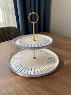 two tiered plates on a wooden table