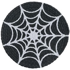 a black and white spider web rug