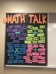 a bulletin board with words written in different languages on it and the word'math talk '