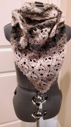 Black & White Skull Wrap, a stylish and edgy crocheted wrap that can be worn as either a wrap or a scarf. This unique accessory features an eye-catching design of black and white skulls and crosses, making it a standout piece in any outfit. Crafted with care and attention to detail, this scarf is handmade, 2 skeins of Rozetti Alpaculence Yarn. Fiber content is 76% acrylic/9% wool/9% alpaca/6% glitter. This item is hand wash only.  Approximately 60 hours to make Heart Crochet, Accessories Unique, Hand Crochet, Scarf Wrap, Alpaca, Crochet Projects, Scarf Accessory, Hand Wash, Accessory Gift