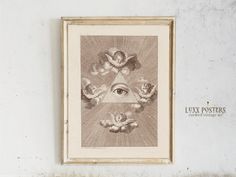 a painting hanging on the wall with an all seeing eye