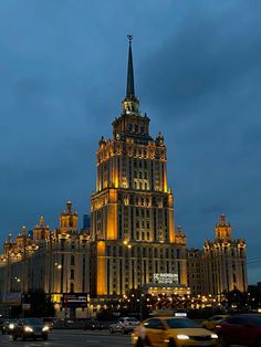 a very tall building lit up at night