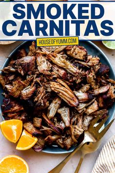 a plate full of sliced up meat and oranges with the title text overlay reads smoked carnitas