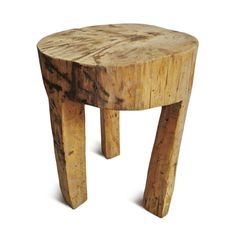 a small wooden stool made out of tree trunks on a white background for use as a side table