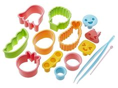 cookie cutters and tools are shown on a white background