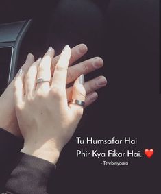 two hands on the steering wheel of a car, with text reading tu humsafar hai phir ka fikar hai