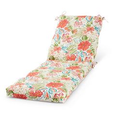 an outdoor chaise lounge chair cushion with floral print on the front and back cover