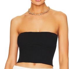 We Wore What Ribbed Tube Top In Black. Sleeveless. Size Xs. New With Tags! Approximate Measurements: (Unstretched) Armpit To Armpit: 10.75” Length: 10” Materials: 50% Viscose 28% Nylon 22% Polyester Product Details Hand Wash Underbust Outline Ribbed Knit Fabric Revolve Style No. Wwwr-Ws116 Manufacturer Style No. Wwdt68-1 Please See Pictures For Details. Feel Free To Comment With Any Questions. Ribbed Tube Top, Halter Bra Top, We Wore What, Denim Bustier, Denim Corset Top, Black Cropped Tank, Denim Crop Top, White Halter Maxi Dress, Distressed Black Jeans