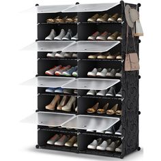 the shoe rack is black and has six rows of shoes on top of each shelf