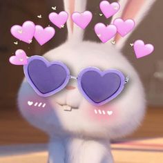 a rabbit with heart shaped sunglasses on it's head and some hearts coming out of its ears