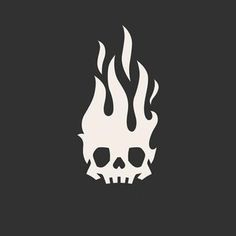 a black and white skull with flames on it