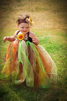 This dress is perfect for pictures at the pumpkin patch, Thanksgiving, or a Scarecrow costume for Halloween! It comes with a matching headband. Dress is made with a crocheted top with individual tulle strands tied on. The tulle is double layered but does not have an underlayer. Bloomers or leggings may be needed. Tulle colors: Brown, gold, green, and Sparkling Orange Pumpkin Patch Outfit Ideas, Scarecrow Tutu, Thanksgiving Tutu, Halloween Tutu Dress, Scarecrow Costume, Patch Outfit, Halloween Tutu, Fall Scarecrows, Pumpkin Patch Outfit