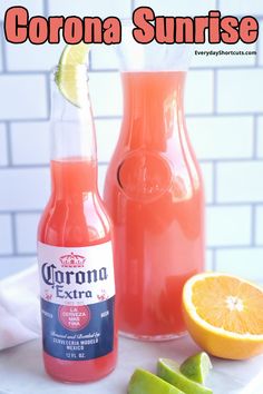 an orange drink and some sliced fruit on a white tray with the words corona sunrise next to it