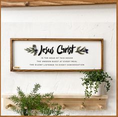 a wooden sign that says jesus christ is the reason of this house