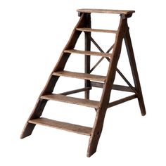 an old wooden step ladder on a white background