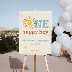 a sign that says, one happy boy celebrating jayce's first birthday with balloons in the background