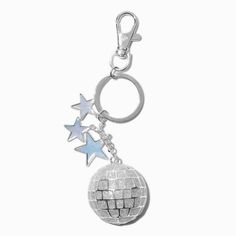 a silver key chain with stars hanging from it's end and a disco ball in the middle