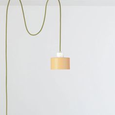 a lamp that is hanging on a wall