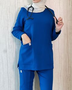 Royally comfortable in TSP’s royal blue long sleeves scrubs 👑💙 . Royal Blue Scrubs Outfit, Long Sleeve Scrubs, Hijabi Wardrobe, Nurse Clothes, Royal Blue Scrubs, Stylish Scrubs, Medical Scrubs Outfit, Scrubs Dress