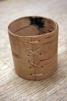 a wooden ring sitting on top of a table