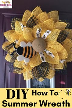 a yellow mesh sunflower with bees on it is hanging from the front door,