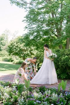 the bride is getting ready to walk down the aisle