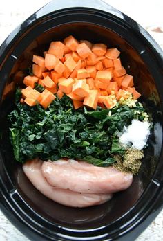 the slow cooker chicken, kale, and sweet potato stew is ready to be eaten