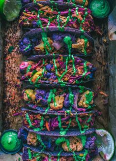 a tray filled with lots of food covered in sprinkles and toppings