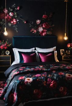 a bedroom decorated in black and pink with flowers on the wall, bedding and pillows