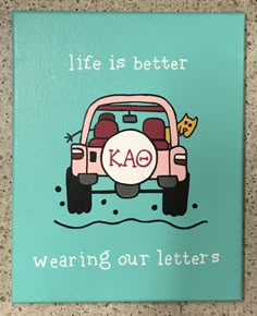 a sign that says, life is better wearing our letters