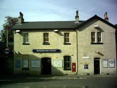 an old brick building on the corner of a street