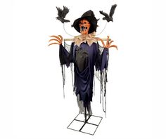 an image of a scary scarecrow with crows on it's head and hands