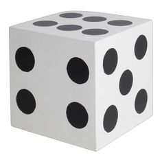 a white dice with black dots on it