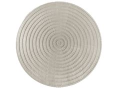 a round rug with an abstract design on the center and bottom, in grey tones