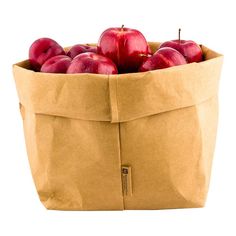 a brown paper bag filled with red apples