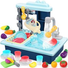 a toy kitchen sink filled with lots of toys