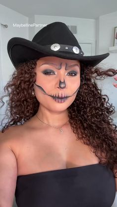 Giddy up for a spooktacular Halloween with this adorable Cowgirl Skeleton makeup look! Think sweet-but-spooky skeletal details, a touch of shimmer, and your cutest cowgirl hat! Shop this easy Halloween look today with products from Maybelline!  Products Used: Color Tattoo Eye Stix, Color Tattoo Studio Eye Pencil, Master Precise All Day Liquid Eyeliner, Sky High Mascara Cowgirl Skeleton, Skeleton Makeup Tutorial, Cowgirl Makeup, Maybelline Products, Halloween Makeup Tutorial Easy, Tattoo Eye, Maybelline Color Tattoo, Cute Halloween Makeup, Skeleton Makeup