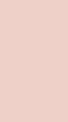 an image of a pink background that looks like linen