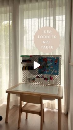 a child's table in front of a window with the words ikea toddler art table on it