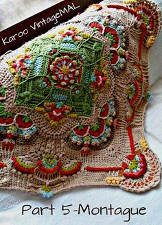 a crocheted pillow with an elephant on it's back and the words, karo virtagnali part 5 - montageaue