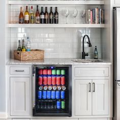 an open refrigerator filled with lots of drinks