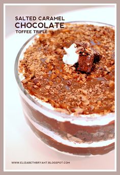 a dessert in a glass dish with chocolate toppings on top and the words salted caramel chocolate toffe triple above it