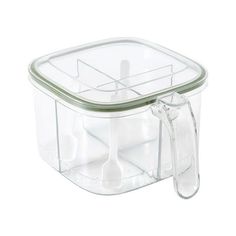 a plastic container with spoons in it