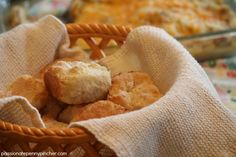 a basket filled with bread on top of a table