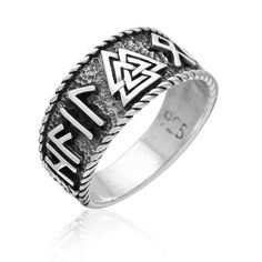 a silver ring with the word faith in black and white letters on it's sides