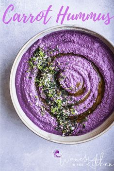 a bowl filled with purple and green food