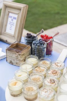 an assortment of desserts are displayed on a table