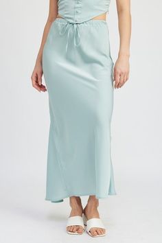 Elevate your wardrobe with our exquisite Satin Midi Skirt, a piece that effortlessly blends sophistication with modern flair. Picture yourself gliding through a candlelit dinner or twirling on the dance floor, the sumptuous fabric caressing your skin with every movement. This skirt isn't just an item of clothing; it's a statement of confidence and grace. The high-waisted silhouette accentuates your curves, while the midi length offers a perfect balance of allure and elegance. As you slip into th Satin Maxi Skirt, Satin Midi Skirt, Satin Maxi, Maxi Skirts, 2024 Fashion, Bustier Top, Satin Material, Romper Dress, Matching Dresses