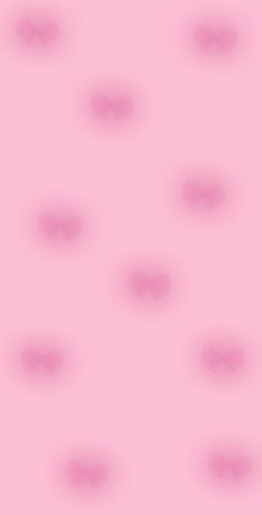 a pink background with small circles on it