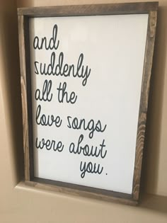 a wooden frame with some writing on it